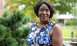 Marvella Ford stands outside on MUSC campus